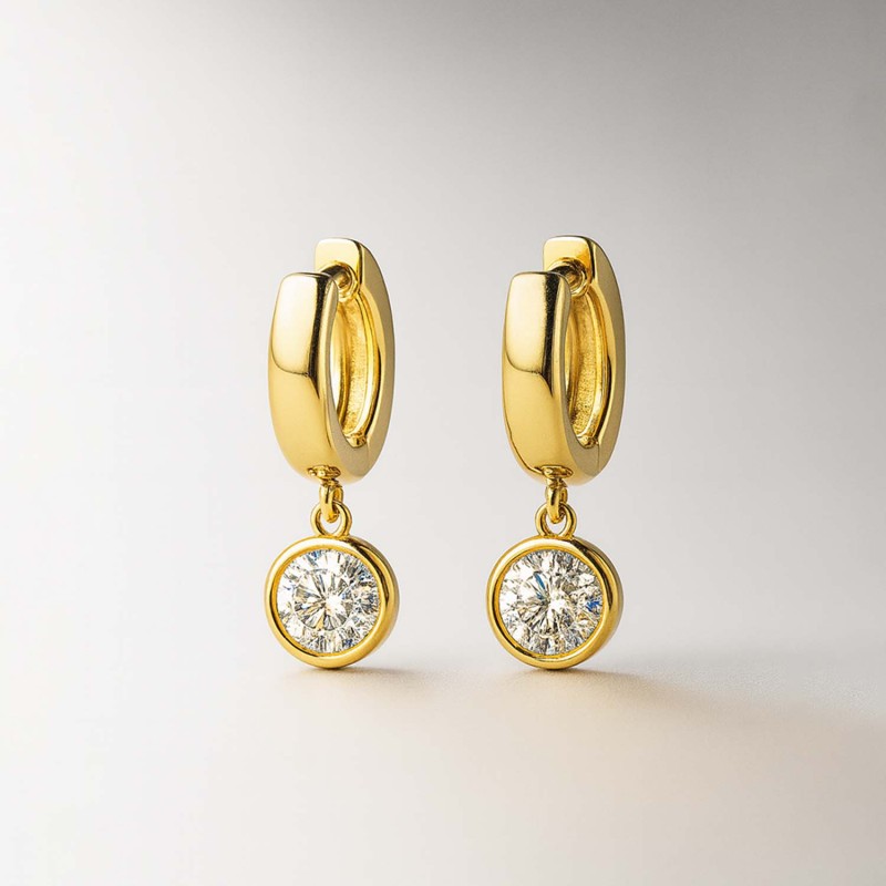 Aros Huggies con circón colgante Dorados