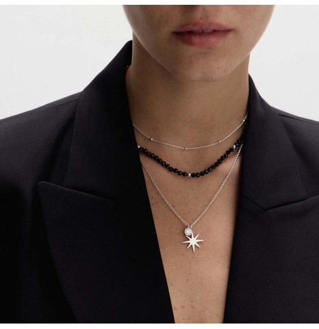 Cadena de plata de bolitas combinada con collar de piedras negras y collar de pata con estrella y circonita