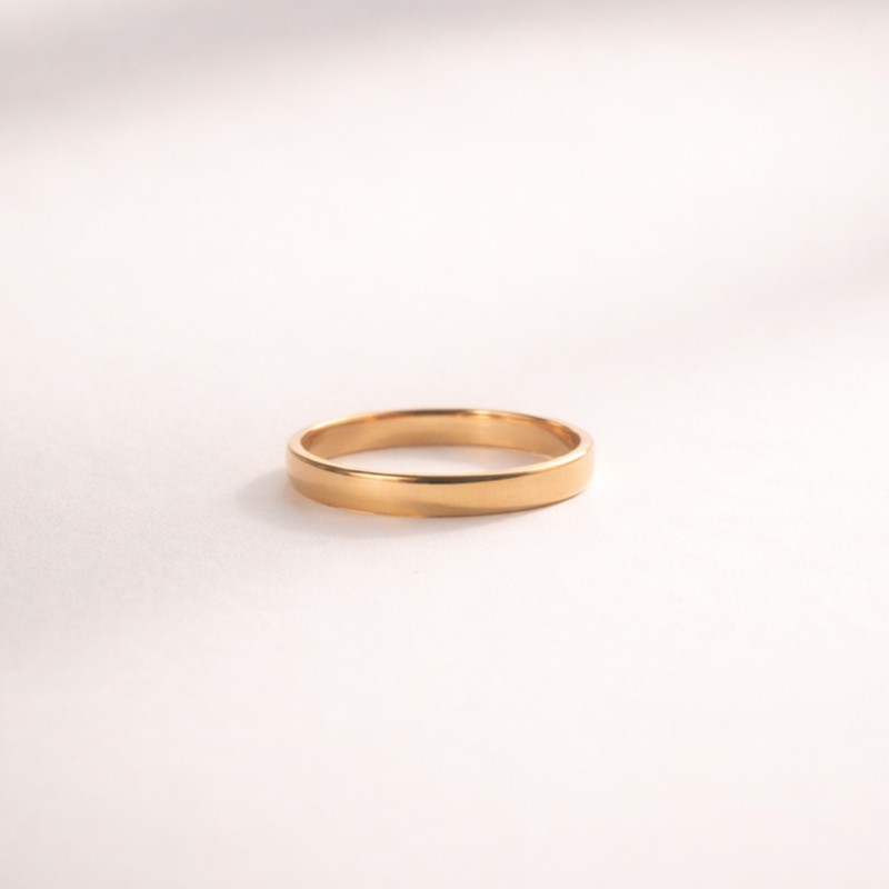 Alianza cinta plana de oro amarillo 3mm con acabado pulido. Joyería artesanal.