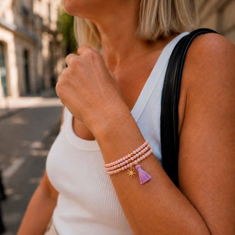 Pulsera triple vuelta de cristales rosa y malva con borla y charm de estrella